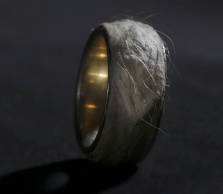 Illustration for article titled Designer makes a leather ring from his own flesh